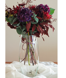Clear glass vase, tall cylindrical shape, transparent, modern minimalist design, flower arrangement display