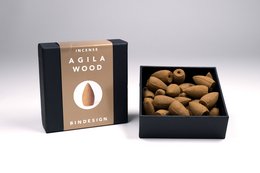 Agilawood incense cones, natural and earthy fragrance, packaged in a black box.