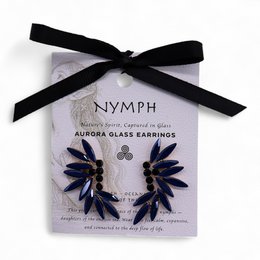  Vintage-inspired crystal earrings in a bold, navy blue color. The earrings feature a cluster of elongated, pointed glass stones that create a dramatic, statement-making look.