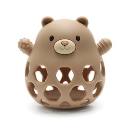 Silicone motor ball bear sorting toy in sand color. Soft, textured surface with openings for sensory exploration and fine motor development. Suitable for babies and toddlers.