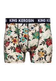 Beige boxershorts with a floral tattoo-inspired print, featuring a variety of colorful flowers and leaves. Made of soft, breathable material for comfortable wear.