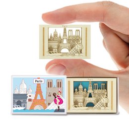 Decorative Paris silhouette box featuring iconic landmarks like the Eiffel Tower, Arc de Triomphe, and Notre Dame Cathedral. Made of wood with a vintage-inspired design.