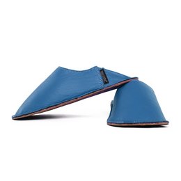 Leather slippers in a blue color with a pointed toe design. The slippers have a simple, minimalist style.