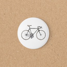 Round white magnet with black bicycle road bike illustration design