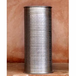 Tall, cylindrical umbrella stand made of silver-colored metal with a textured, hammered surface pattern.