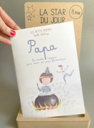 Children's book titled "Papa" with illustrations depicting a young boy and his father. The book appears to be a gift for a special occasion such as a birthday or holiday.