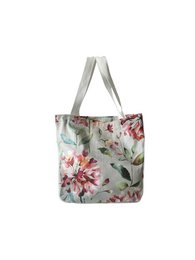 A large, floral-patterned tote bag with a zip pocket, suitable for shopping or everyday use.