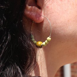 Hoop earrings with different beads green