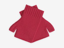 Coral pink fingerless gloves with ribbed texture and open fingers for dexterity.