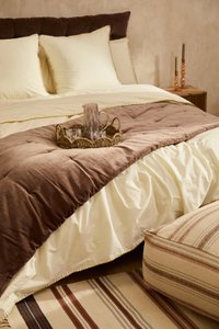 Gesteppter Topper aus braunem Velourssamt