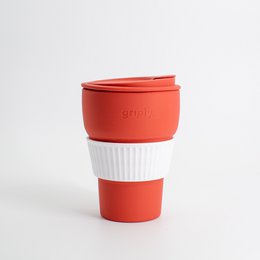 A foldable, reusable coffee cup made of durable silicone material in a vibrant red color. The cup has a capacity of 355 ML and is available in multiple color variants including Arcadian green, Mint, Pink, and Summer green.