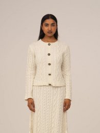Cardigan bianco lavorato a maglia nuda