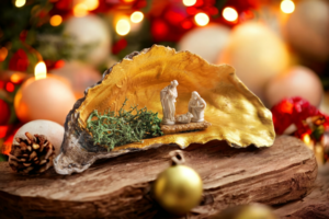 Weihnachtskrippe in einer Auster