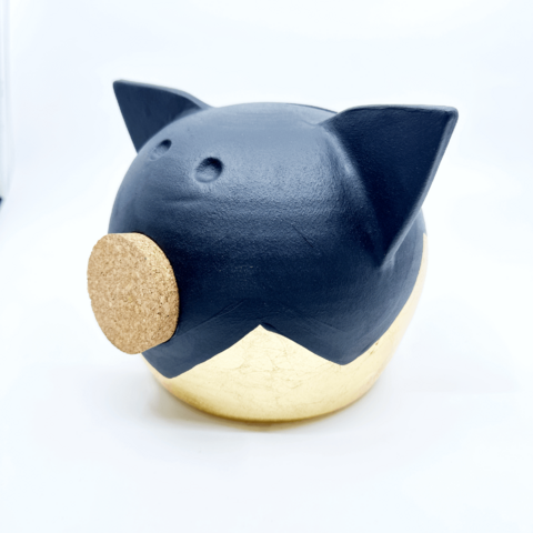 Verdeelde gouden piggy bank