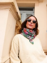 Green Indore scarf with colorful floral pattern, lightweight fabric, versatile accessory for adults, vibrant print design.