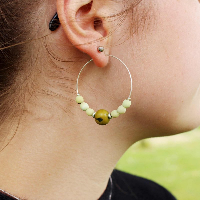 Hoop earrings with different beads green