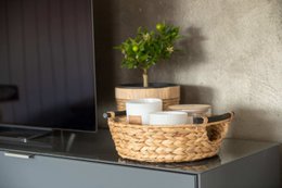 Large laundry tub, basket braided out of water hyacinth with wooden handles