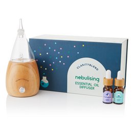 Nebulising aromatherapy diffuser kit with a white and wood-tone diffuser, 2 essential oil blends, and a gift box. Diffuses essential oils into the air for relaxation and wellness.
