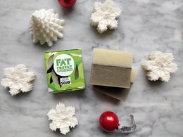 Orange and cedar scented soap bar with natural ingredients.