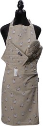  Beige apron with a repeating pattern of small white and yellow flowers. The apron has a simple, classic design that would be suitable for use in a kitchen or for cooking and baking tasks.