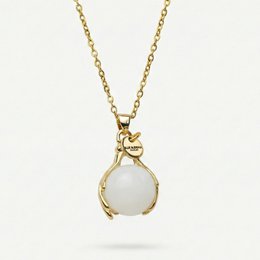 A gold-toned necklace with a white quartz pendant, designed to promote positivity. The necklace features a delicate chain and a small star-shaped charm.