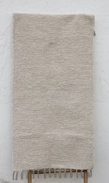 Luxury medium-sized Portuguese Amélia rug in beige, off-white, or camel colors. Super soft and comfortable material.