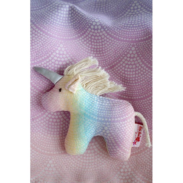 Clutching toy unicorn Arielle Marie