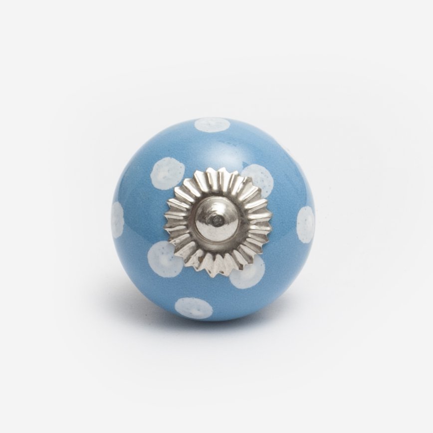 Bouton en céramique bleu à pois blancs