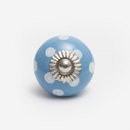 Blauwe keramische knop met witte stippen