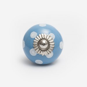 Blauwe keramische knop met witte stippen