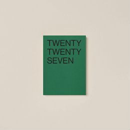  A dark brown journal with the text "TWENTY TWENTY SIX" embossed on the cover.