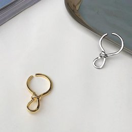 Polsino auricolare con nodo minimalista: pezzo unico