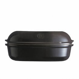 Large red ceramic baking dish for bread and cakes, with traditional design.