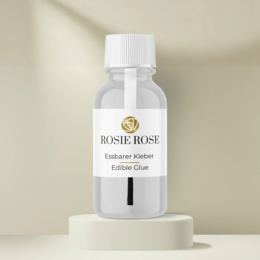 Edible glue for baking decorations. Clear, viscous liquid in a bottle with a white cap. Suitable for decorating cakes, cookies, and other baked goods.