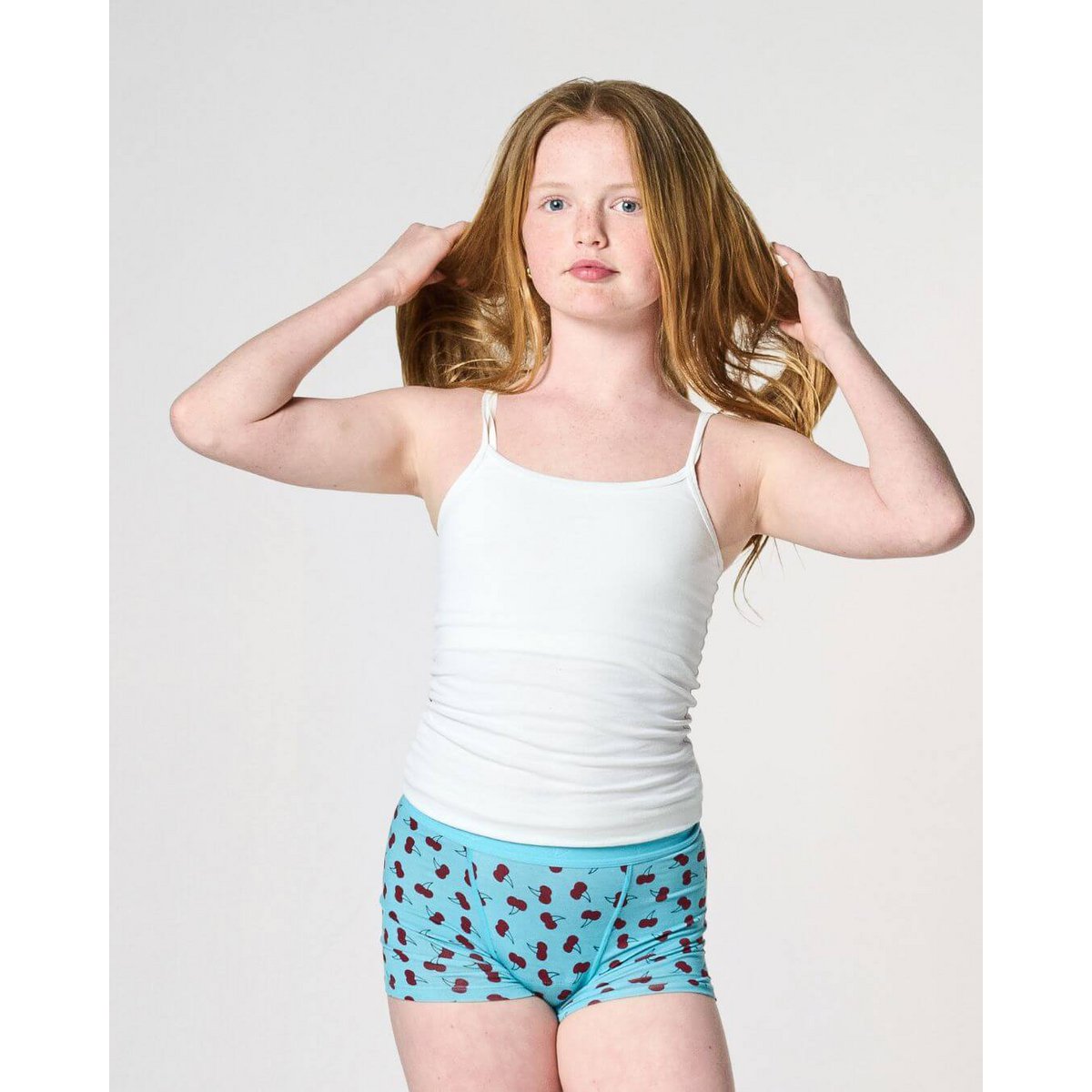 Menstruationshose Boyshort Mädchen – starke Absorption (schwarz, rosa Aufdruck)