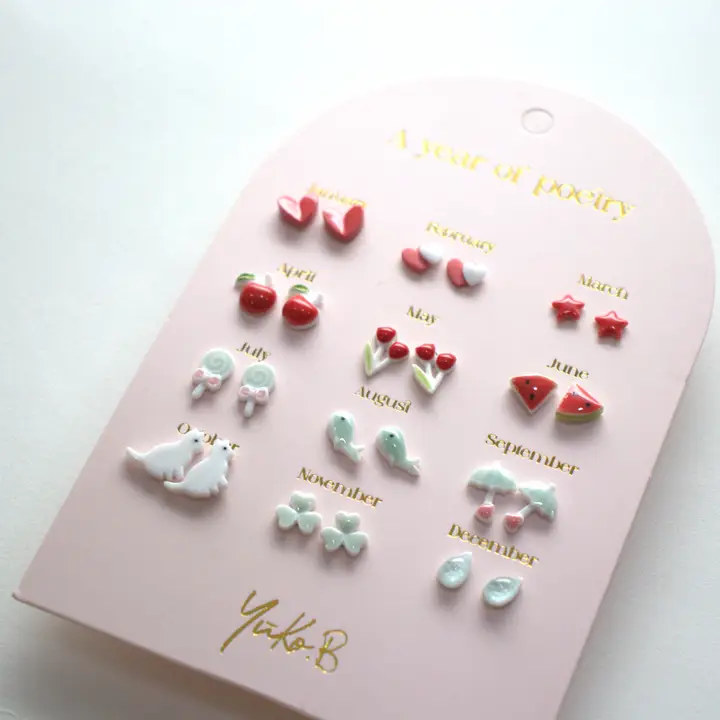 Card of 12 Earrings A Year of Poetry red English