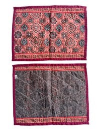# Product Description
Quilted sari placemats, pink red patterned fabric, traditional geometric design, reversible double-sided.