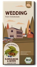 Organic and fair-trade chocolate bar with cardamom and myrtle flavors, featuring a classic European architectural design.