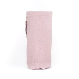 Pastel pink travel bottle with a soft, textured surface. Made of durable material for easy transport and storage.