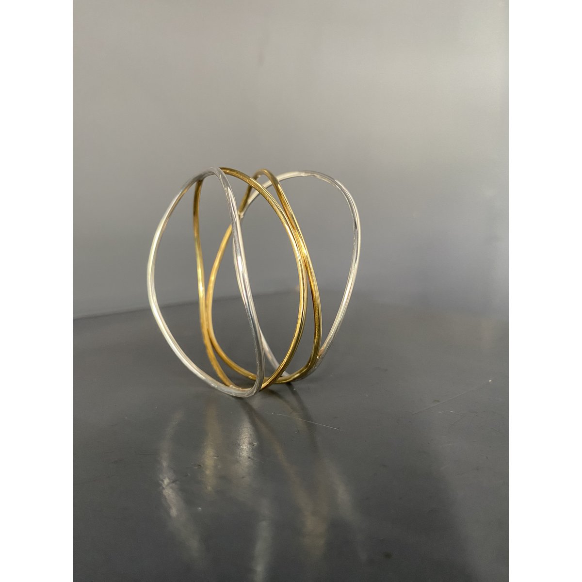 Double Wave Bracelet in silver and brass