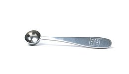 Stainless steel matcha measuring spoon with a rounded bowl shape and a flat handle.