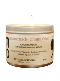 Tall, round, white scented candle with a floral, countryside-inspired fragrance.