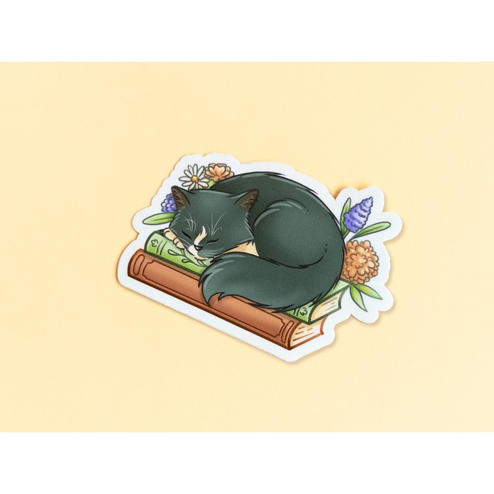 Cat on books sticker