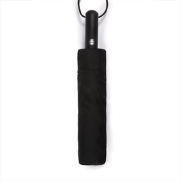 Black, automatic open and close golf umbrella with a textured handle.