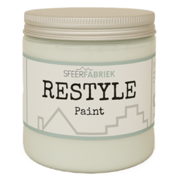 A light mint green chalkpaint in a round container with a metal lid.