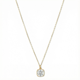 Gold-toned necklace with a clear crystal pendant.