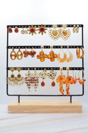 Set van 15 paar oorbellen met display