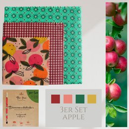 Set of 3 organic beeswax food wraps in apple design, handmade in Germany. Made from natural beeswax, cotton, and tree resin. Reusable, sustainable alternative to plastic wrap.