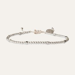 Silver charm bracelet with adjustable clasp.