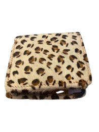 Compact wallet with leopard print pattern, featuring a sleek design and multiple compartments for storage.